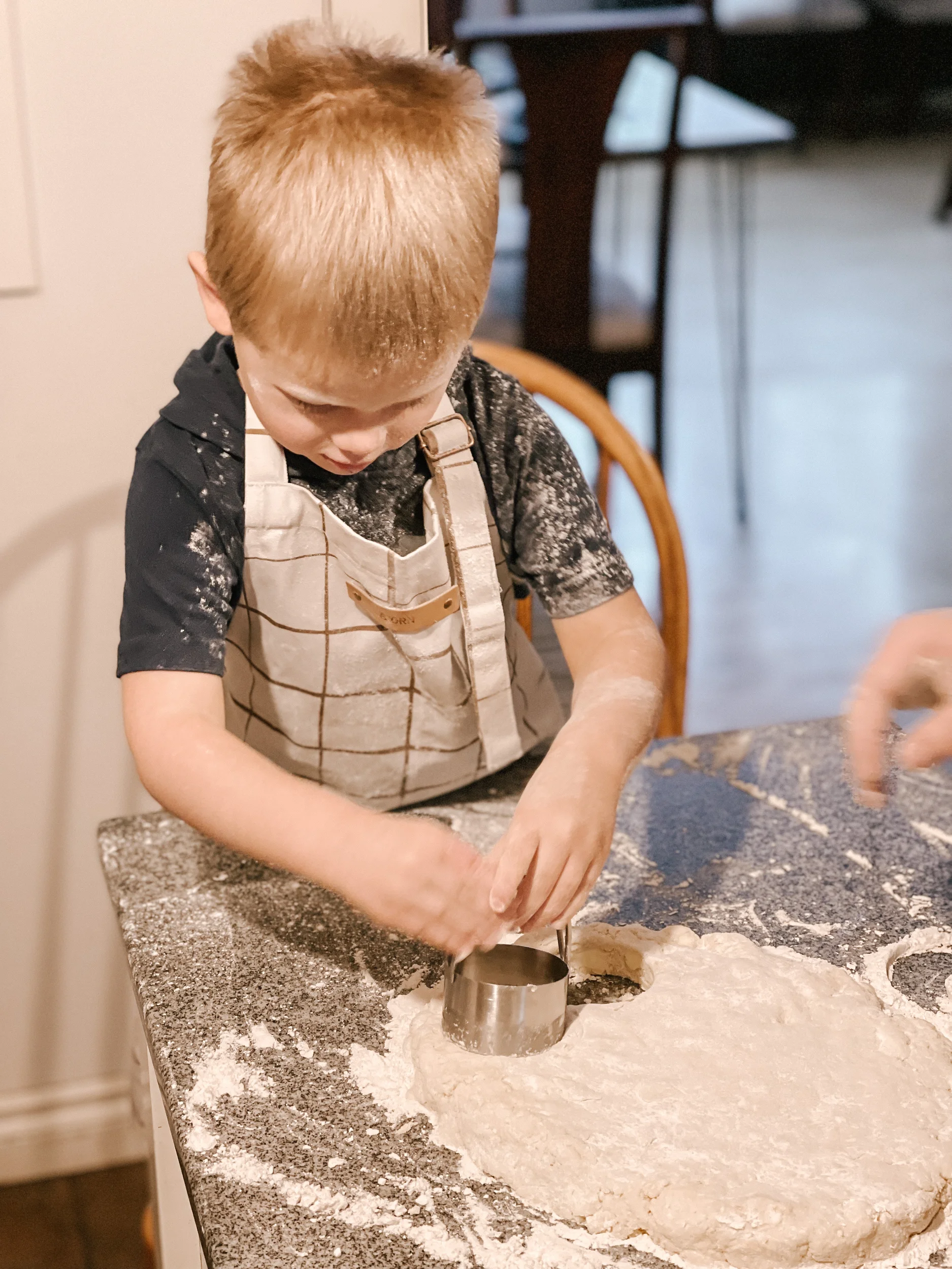boy making biscuits