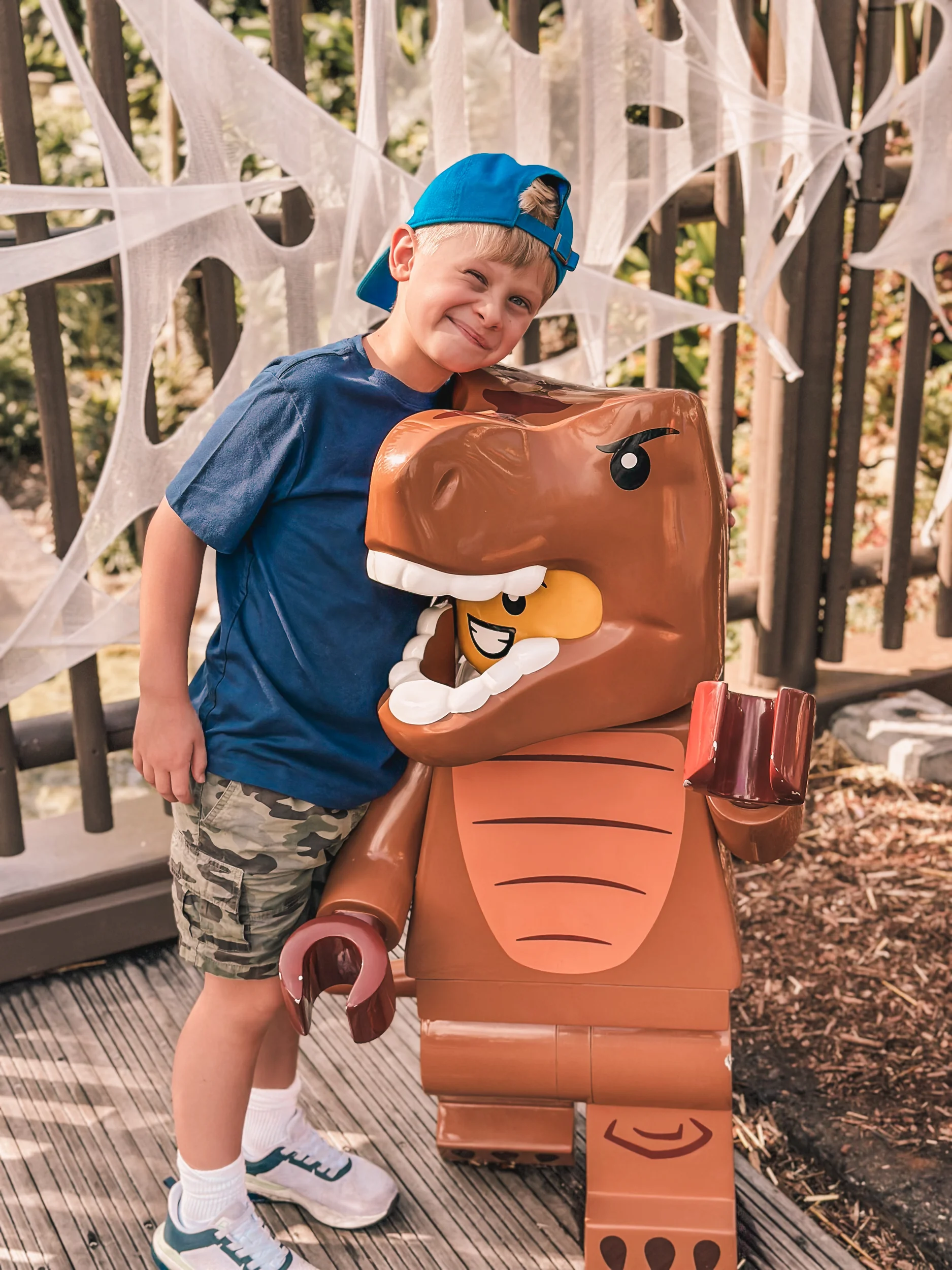 Boy with lego dino
